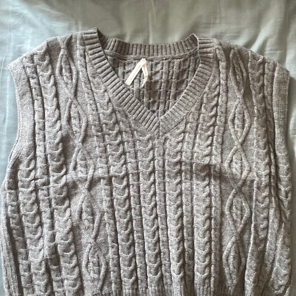 grey sweater vest